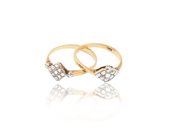 Two yellow gold rings with diamonds