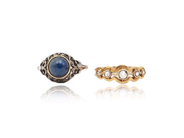 Two rings in yellow gold, white gold and silver with diamonds and sapphire