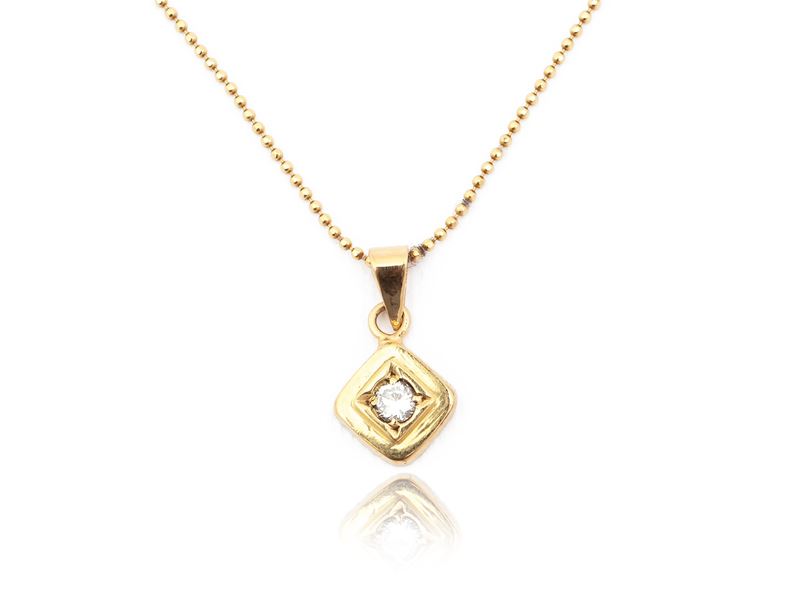 Catenina e Pendente Punto Luce in Oro Giallo con Diamante