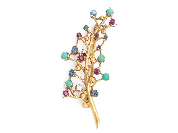 Yellow gold brooch with diamonds, rubies, sapphires and turquoises