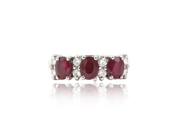 Trilogy ring in white gold with diamonds and rubies
