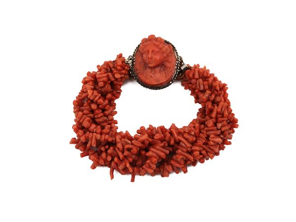 Multi-strand red coral bracelet with silver clasp and red coral cameo