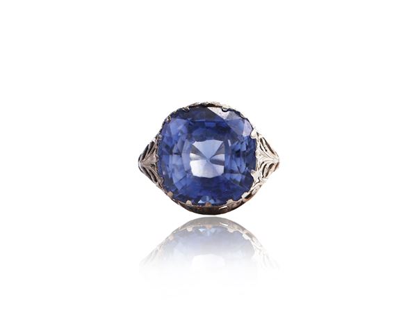 White gold ring with synthetic sapphire