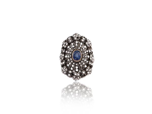 Yellow gold and silver ring with diamond and sapphire