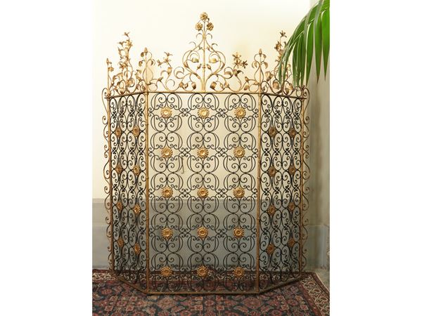 Separate or fire screen in wrought iron and highlighted in gold