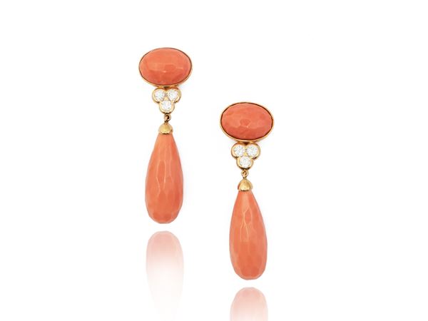 Yellow gold pendant earrings with diamonds and orange pink corals
