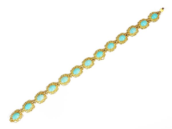 Yellow gold bracelet with turquoises