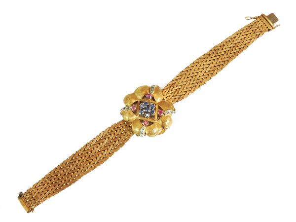 Longines, yellow gold jewel watch with rubies, sapphires and emeralds