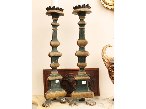 Pair of lacquered wood torches