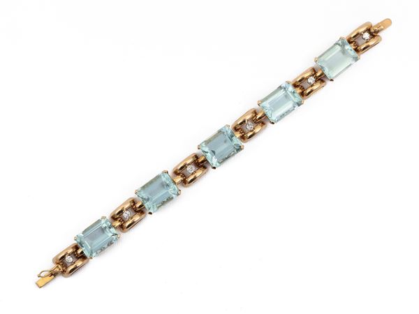 Yellow gold bracelet with diamonds and aquamarines