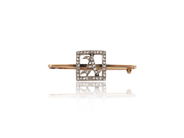 9Kt gold and silver brooch with diamonds