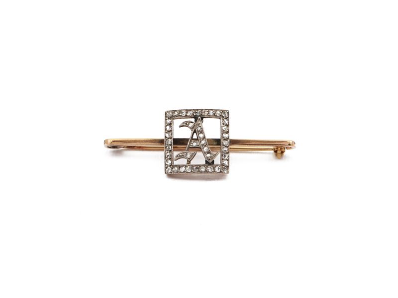 Spilla in Oro 375/1000 ed Argento con Diamanti