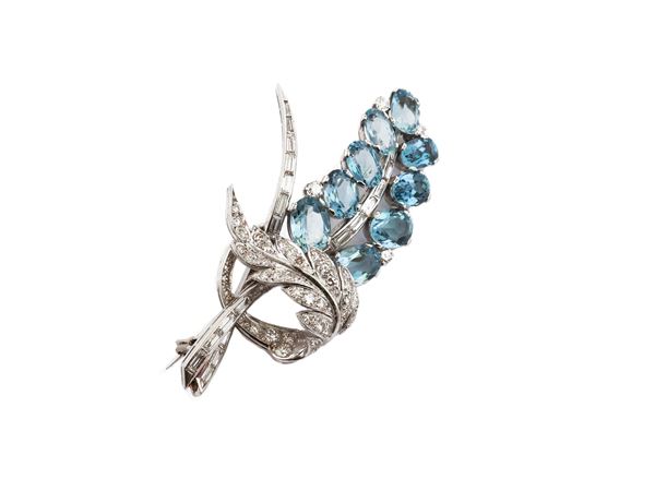 White gold brooch with diamonds and aquamarines