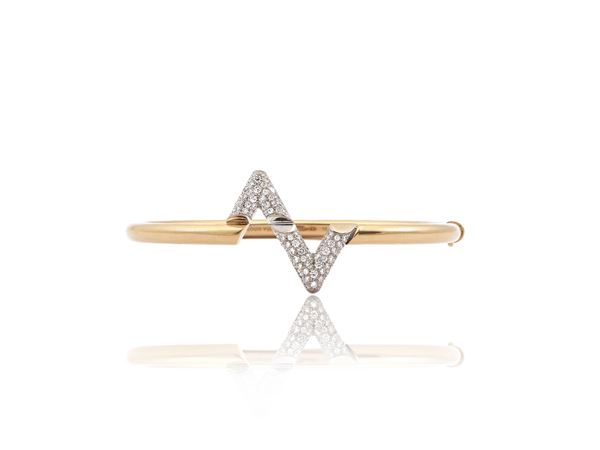 Louis Vuitton, yellow gold 'LV Volt Upside Down' bangle with diamonds