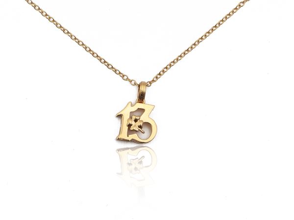 Dolce & Gabbana, yellow gold chain with '13' pendant