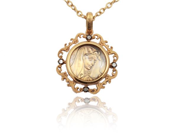 Dolce & Gabbana, yellow gold chain with votive pendant