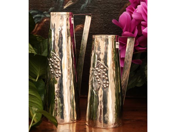 Pair of silver metal jugs, Brandimarte