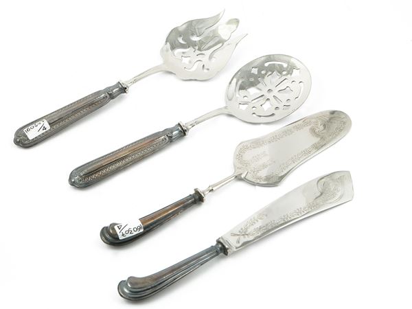 Two sets of dessert serving cutlery with silver-coated handles