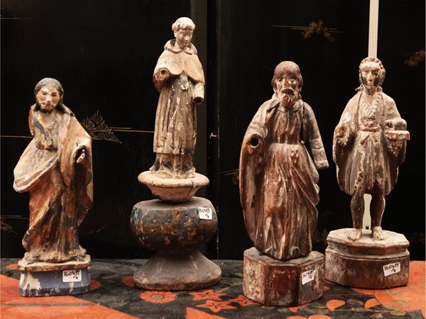 Four wooden figures, probably oriental art