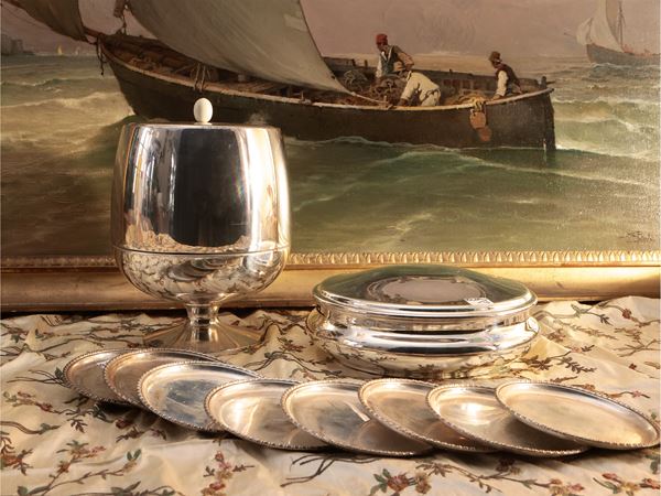 Lotto di accessori per la tavola in metallo argentato