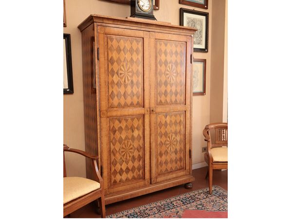 Wardrobe veneered and inlaid in walnut and other essences