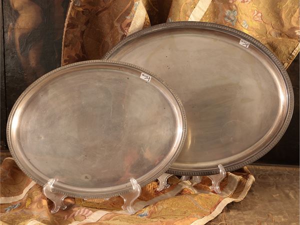Two silver serving trays