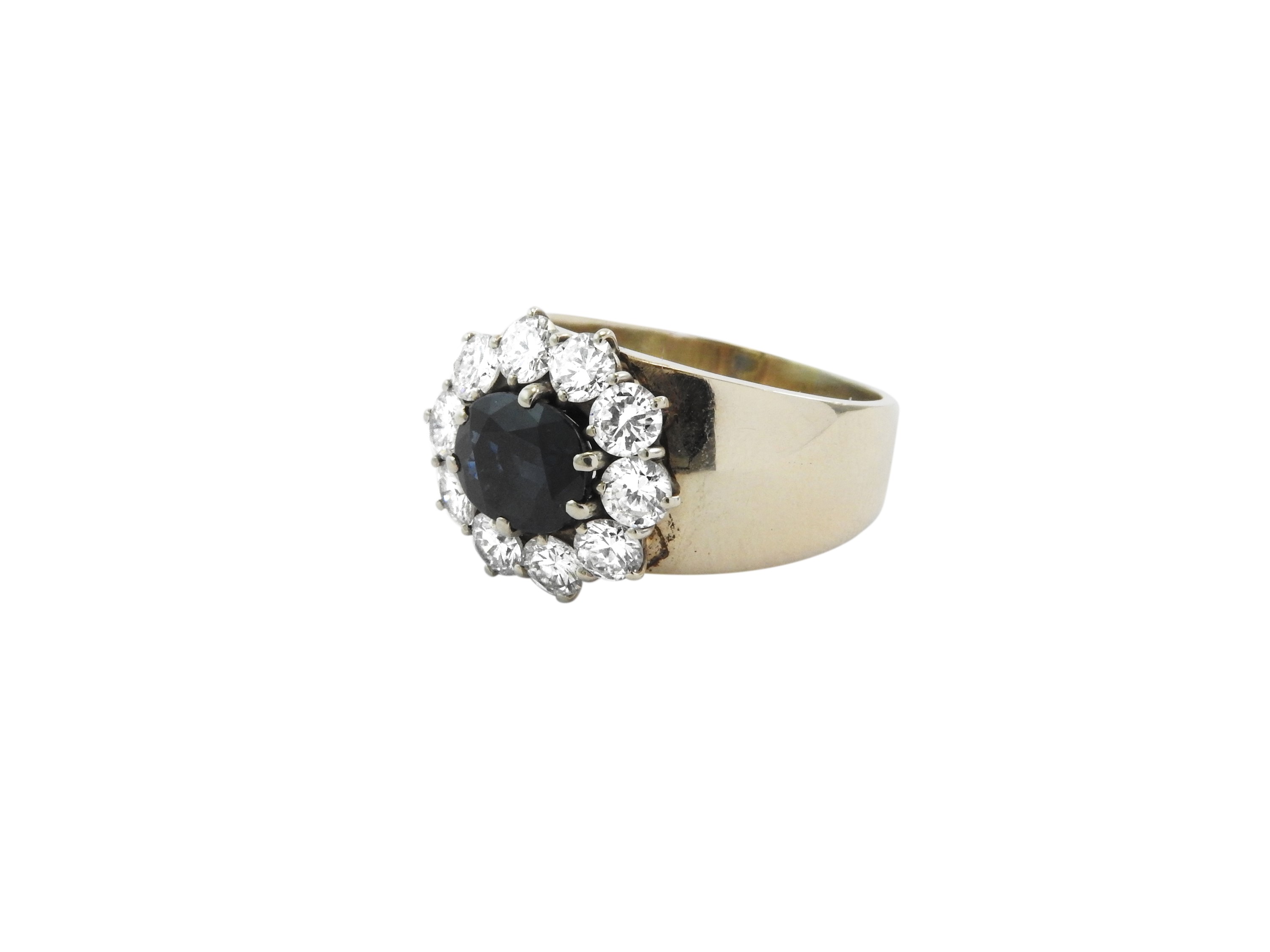 Anello Fascia in Oro Bianco con Diamanti e Zaffiro