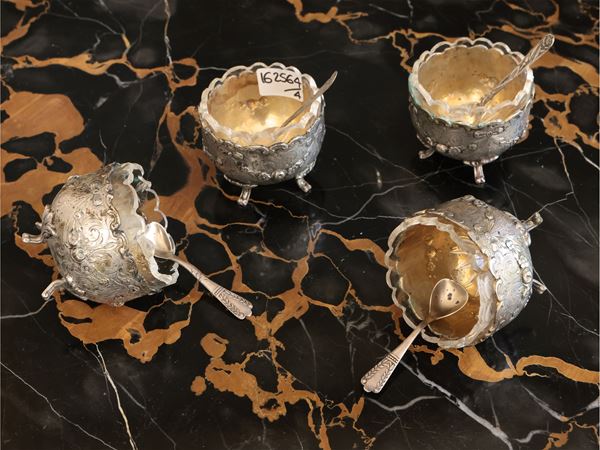 Serie di quattro saliere d'epoca in argento