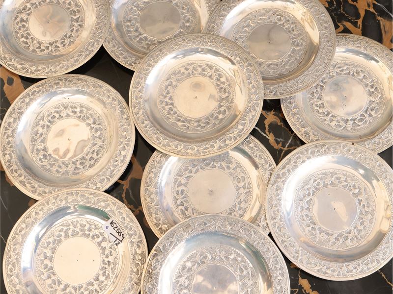 Serie di Dodici Piattini da Pane in Argento