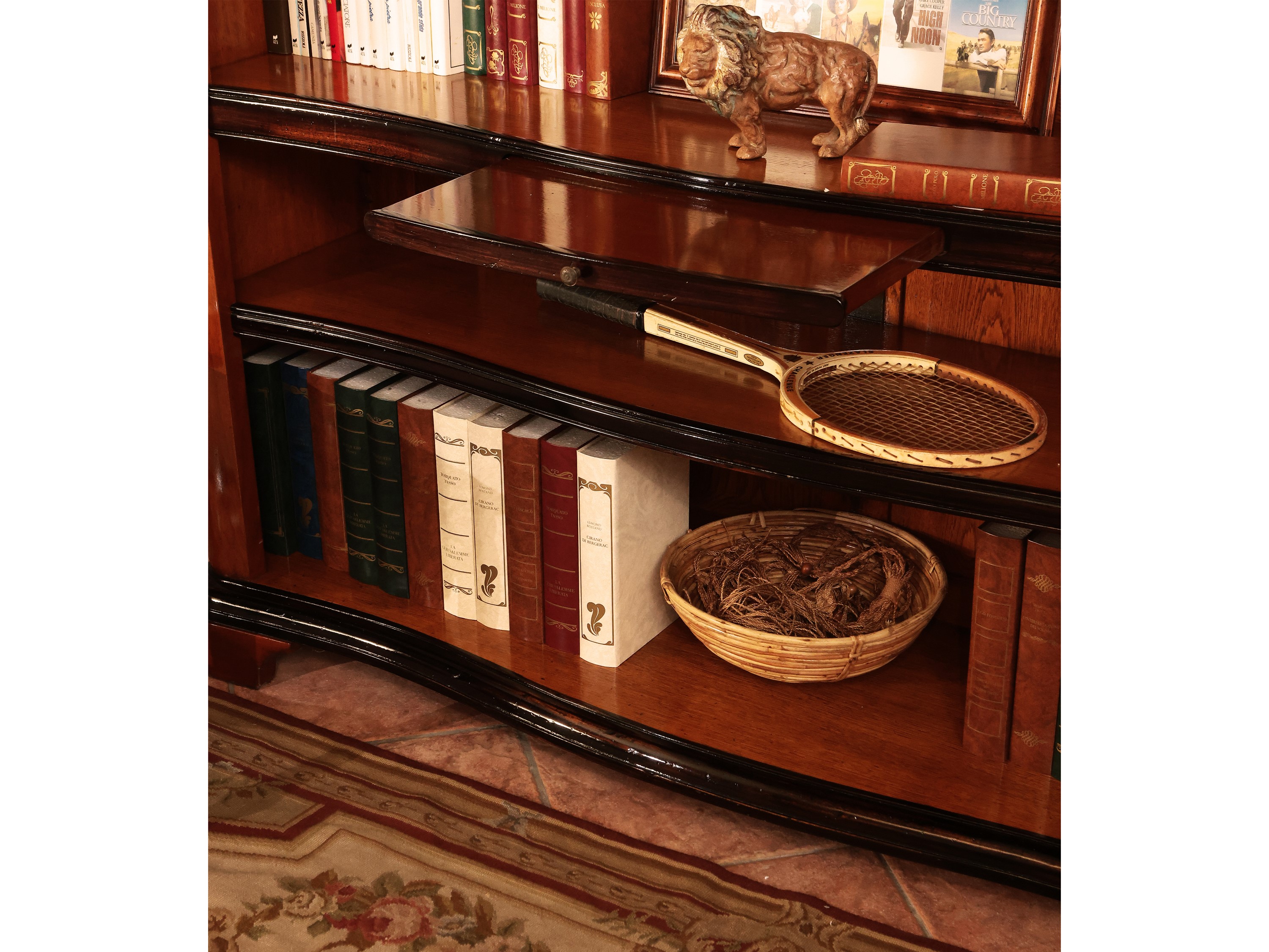 Libreria a giorno con profili in legno ebanizzato