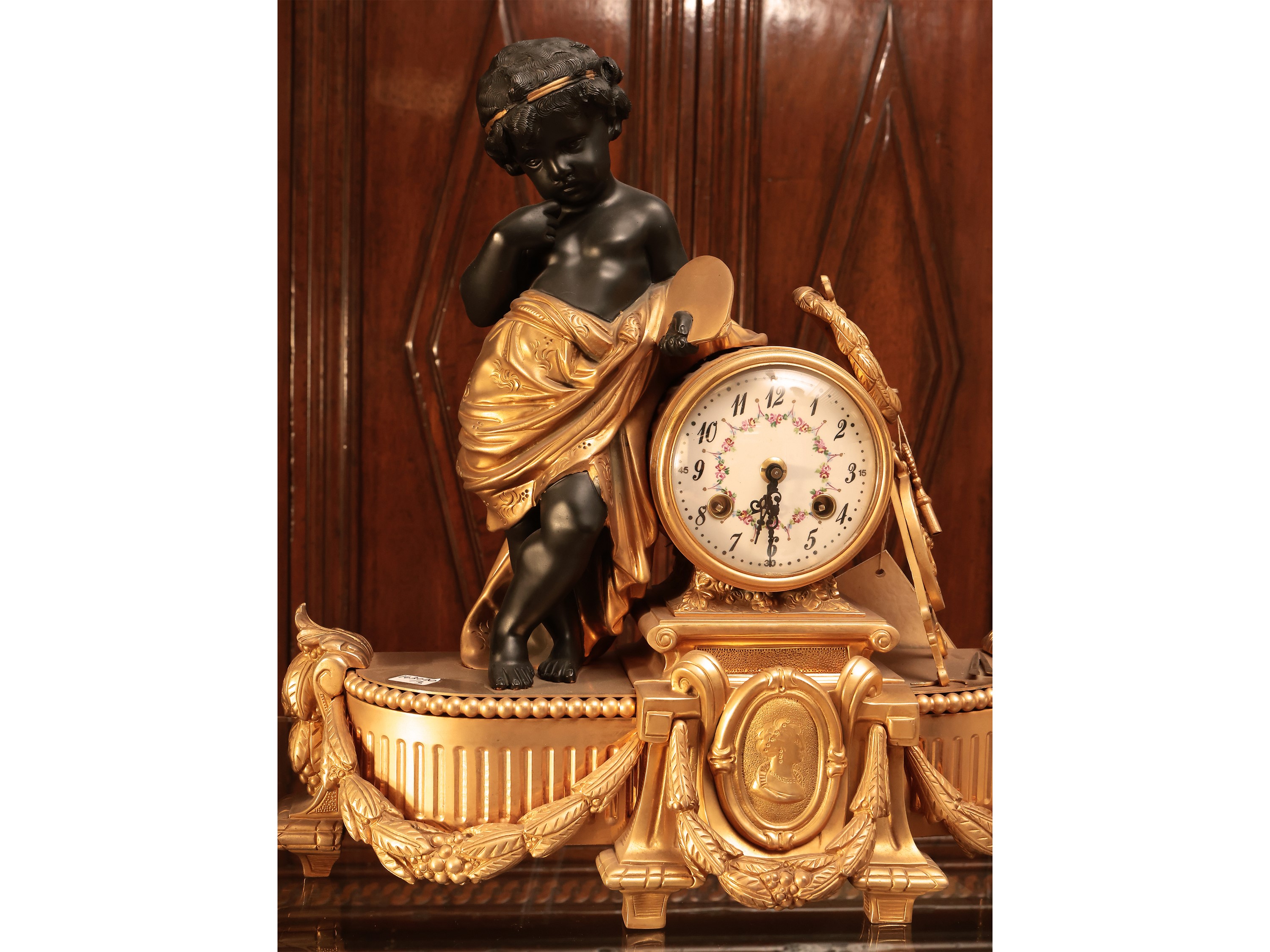 Trittico da camino in bronzo patinato e dorato