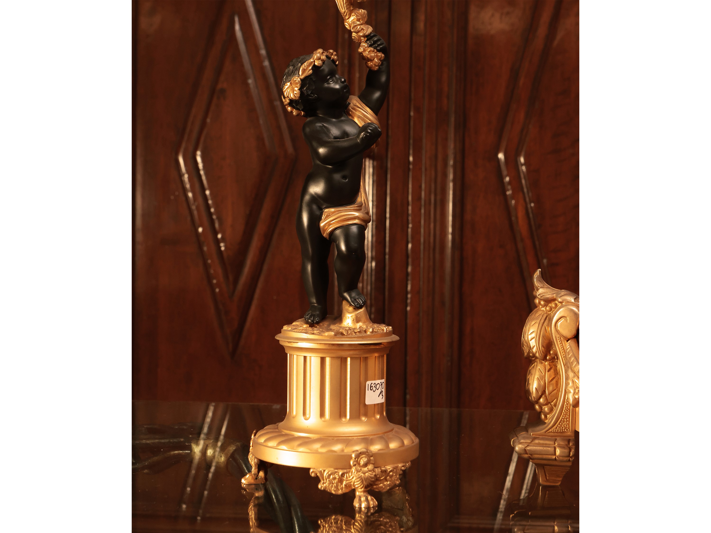 Trittico da camino in bronzo patinato e dorato