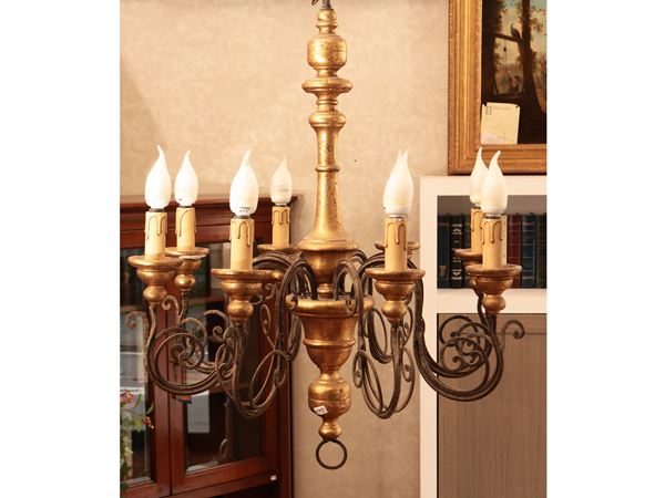 Carved and gilded wooden chandelier