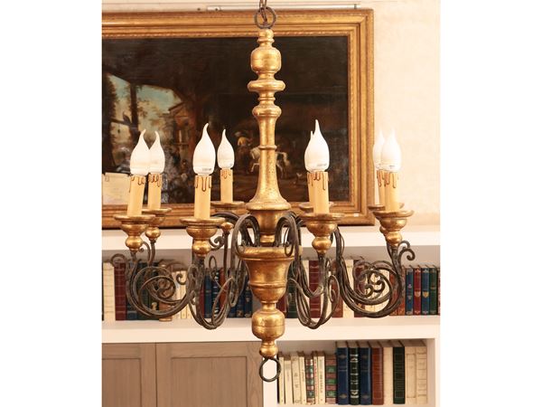 Carved and gilded wooden chandelier