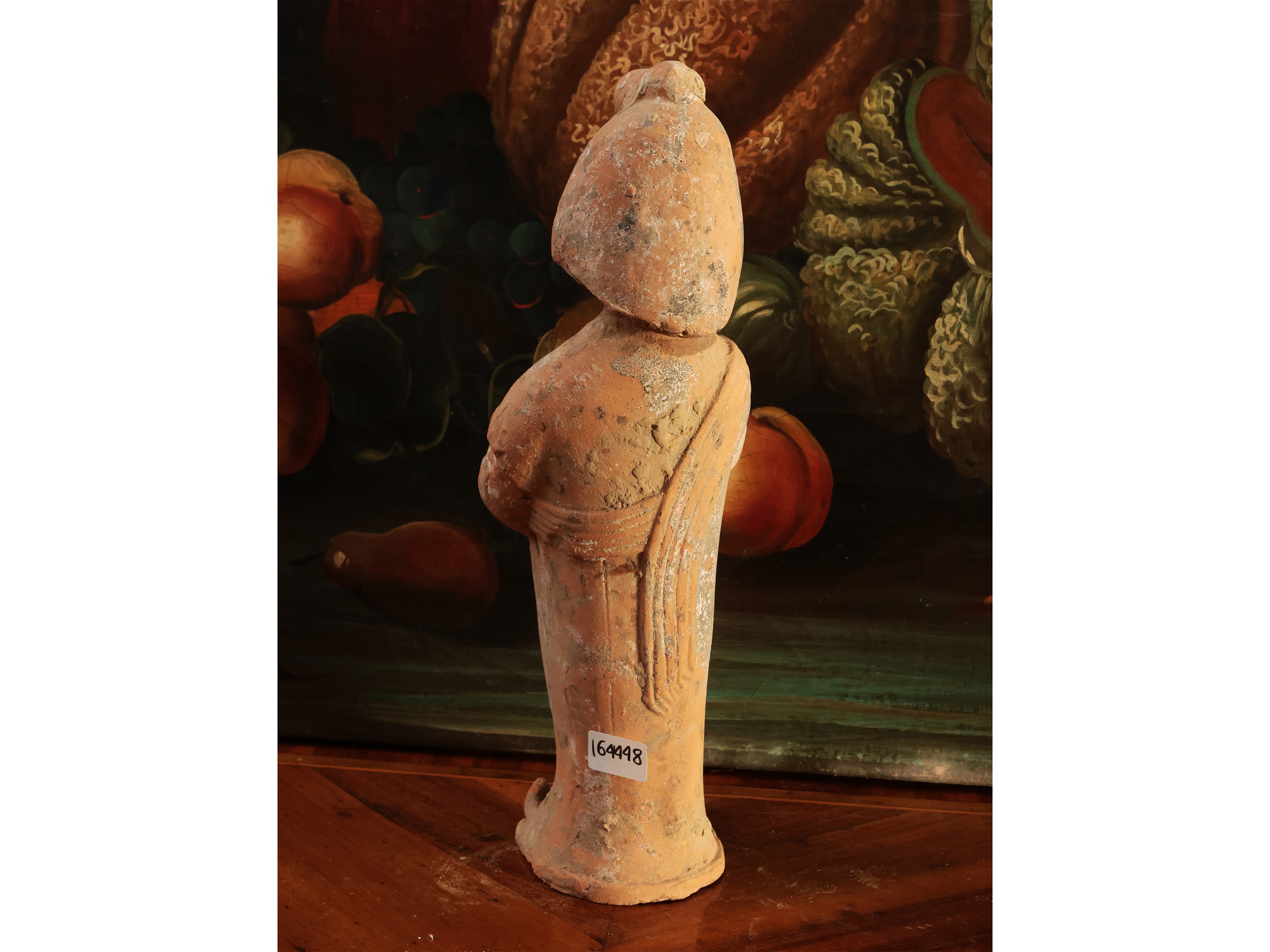 Figura femminile in terracotta