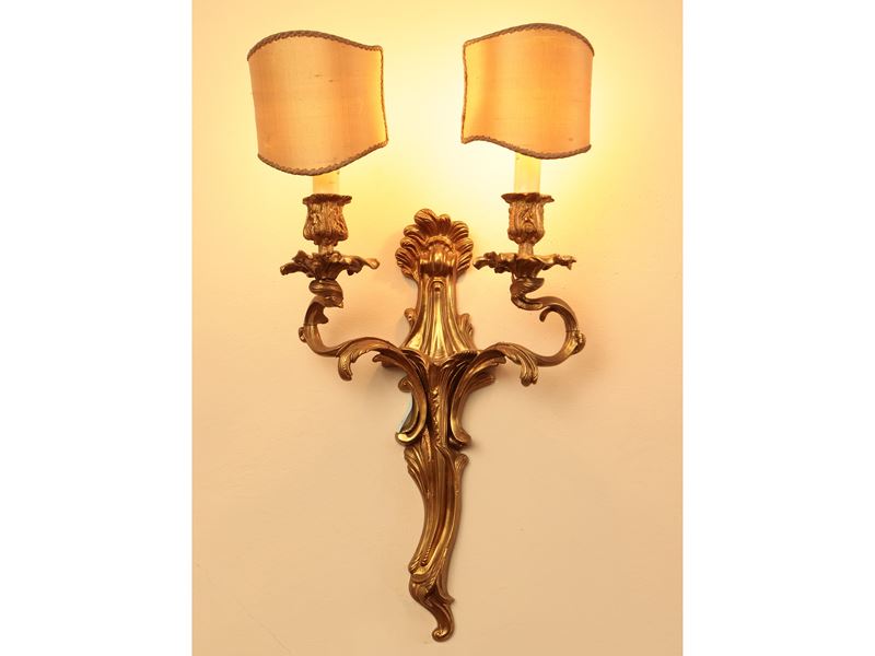Serie di quattro applique in bronzo