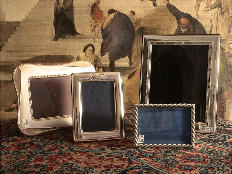 Quattro cornici portaritratti in argento