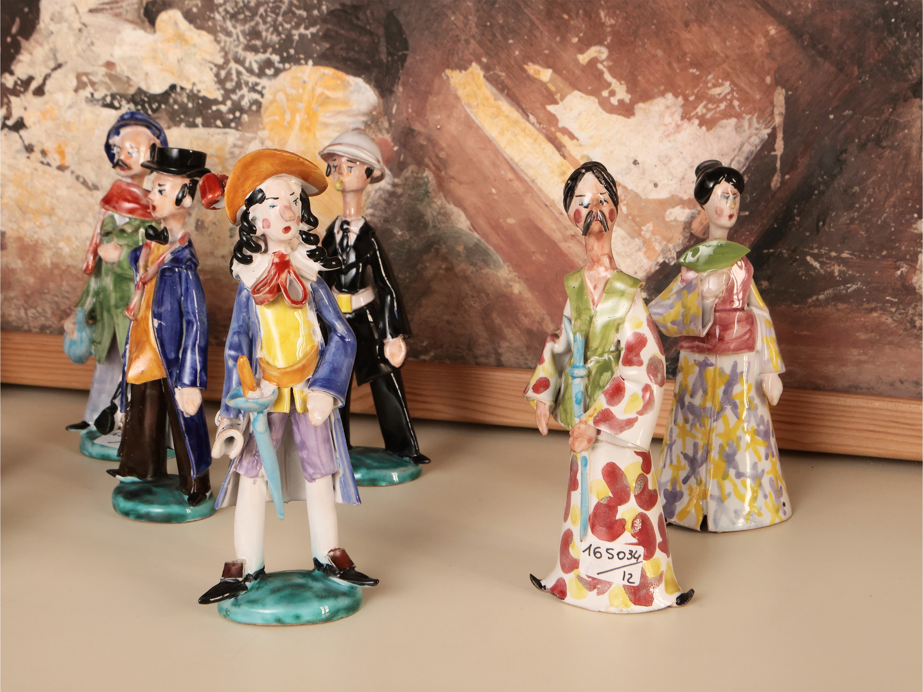 Serie di Dodici Caricature in Terracotta Smaltata