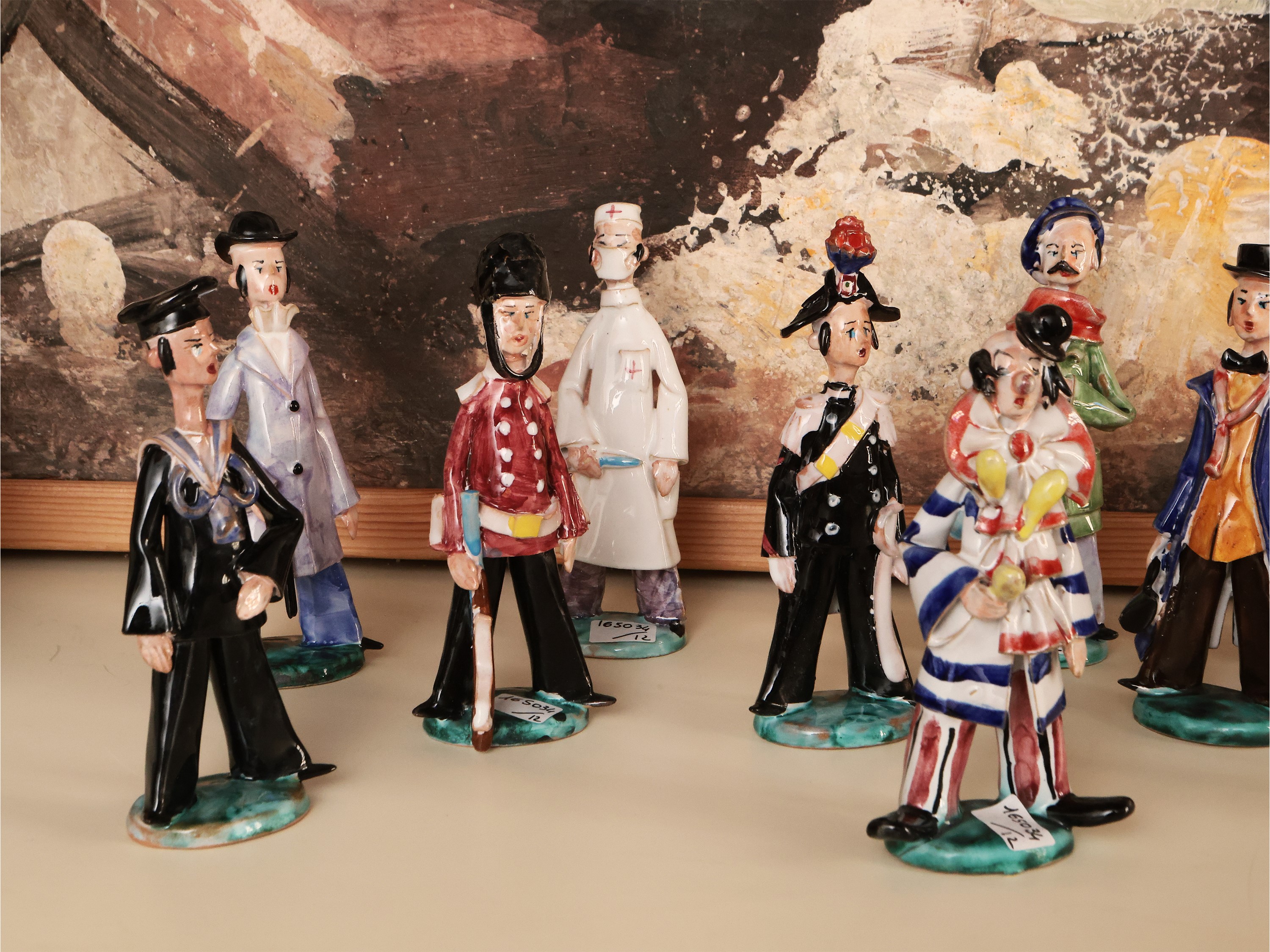 Serie di Dodici Caricature in Terracotta Smaltata
