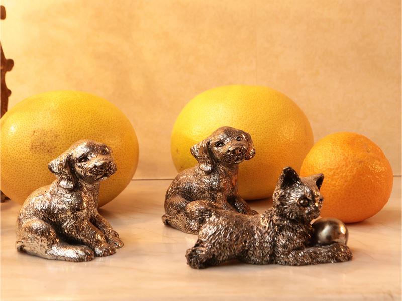 Tre Piccoli Gruppi Animalier Rivestiti in Argento