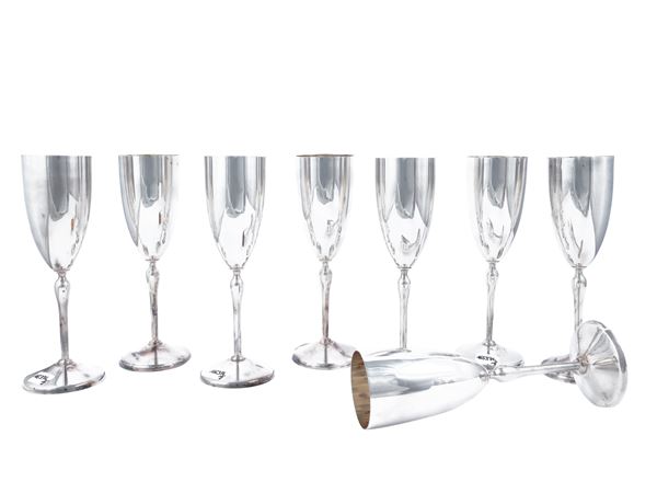 Serie di otto flute in metallo argentato