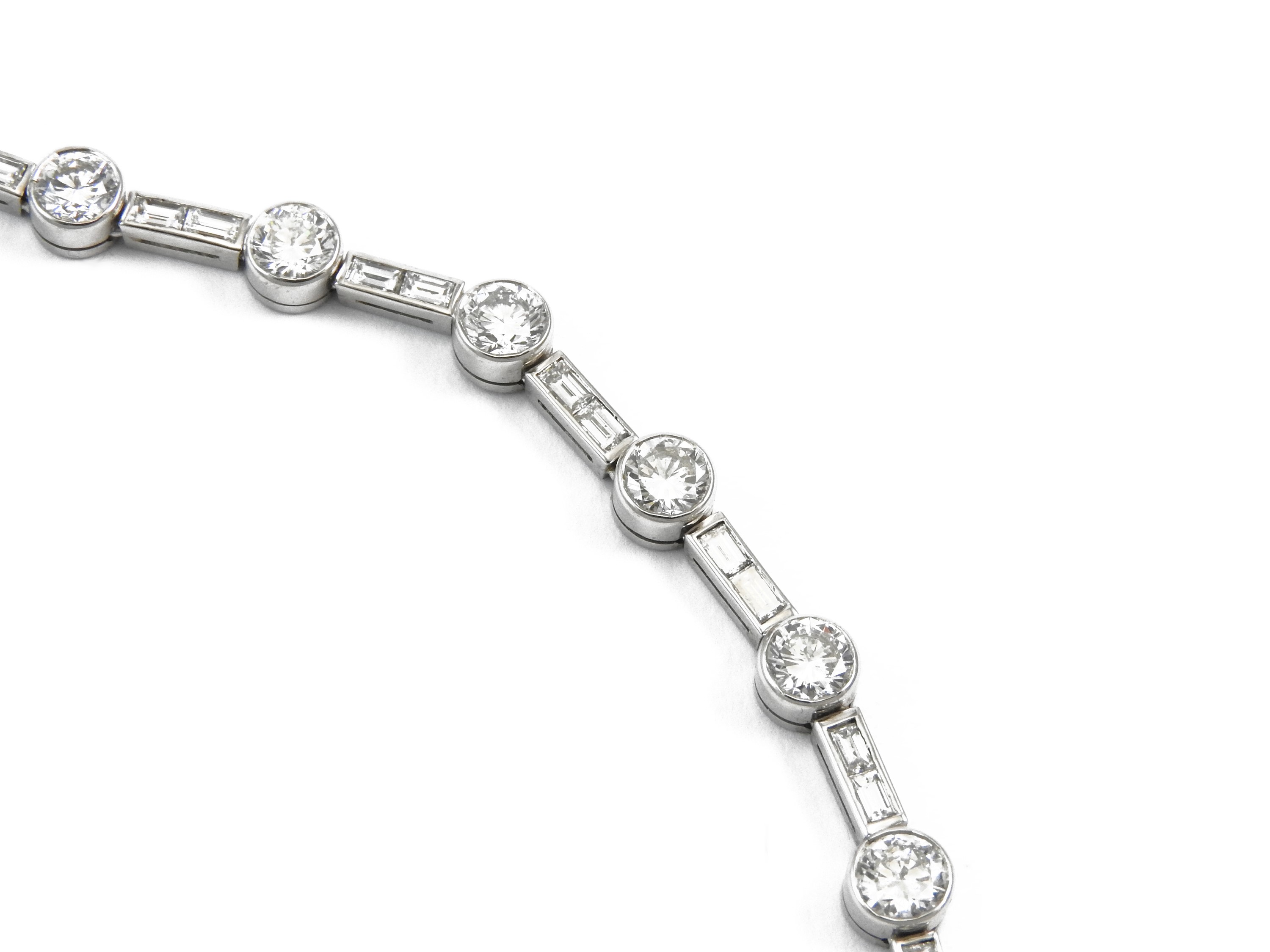 Importante collana rivière in oro bianco e diamanti