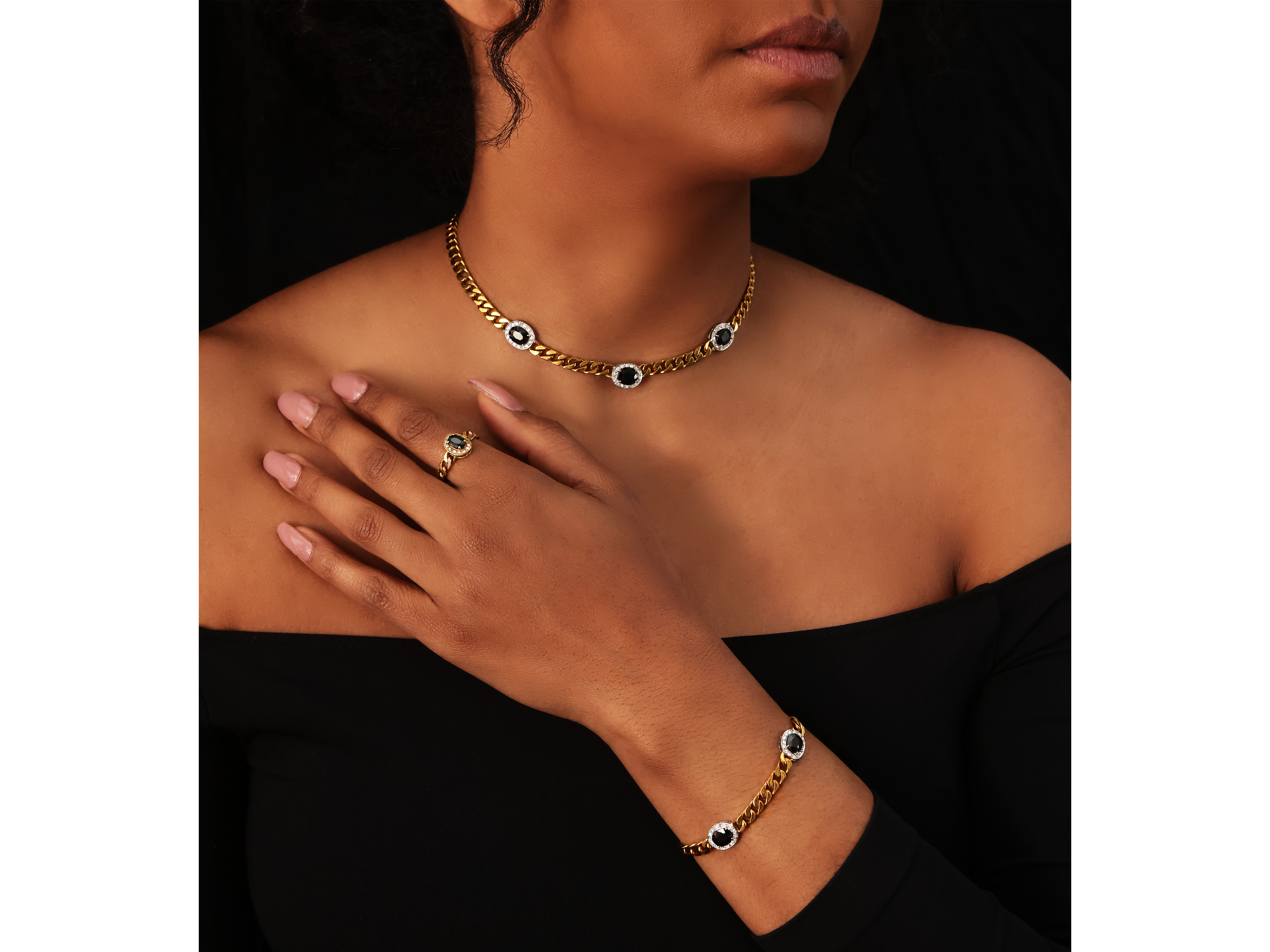 Demi-parure in oro giallo con diamanti e zaffiri