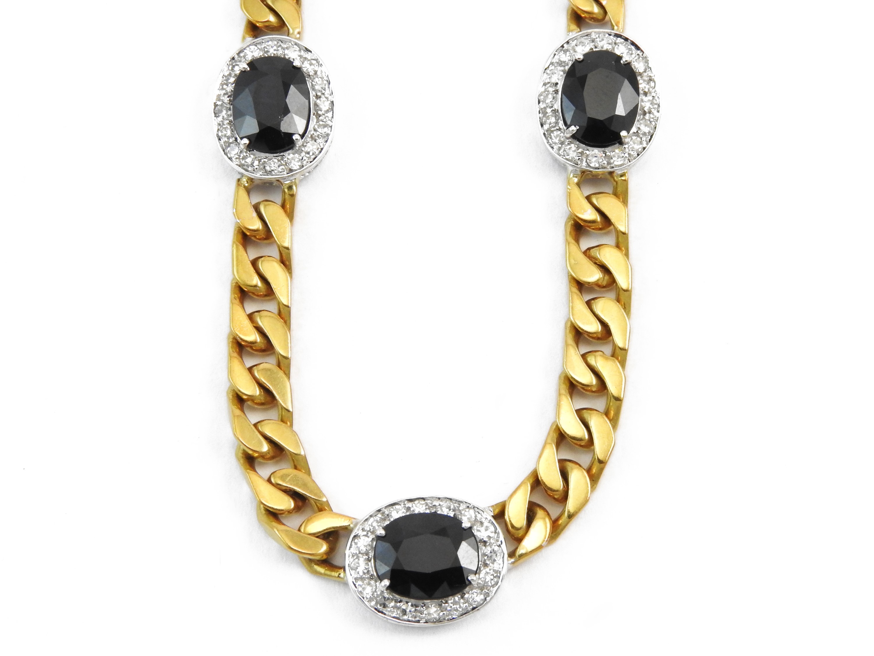 Demi-parure in oro giallo con diamanti e zaffiri