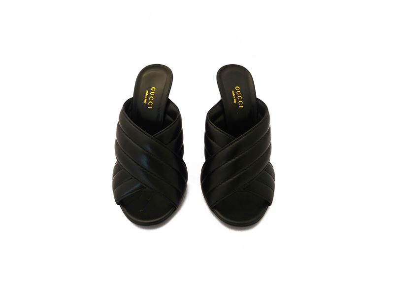 Gucci, Mules in pelle nera trapuntata