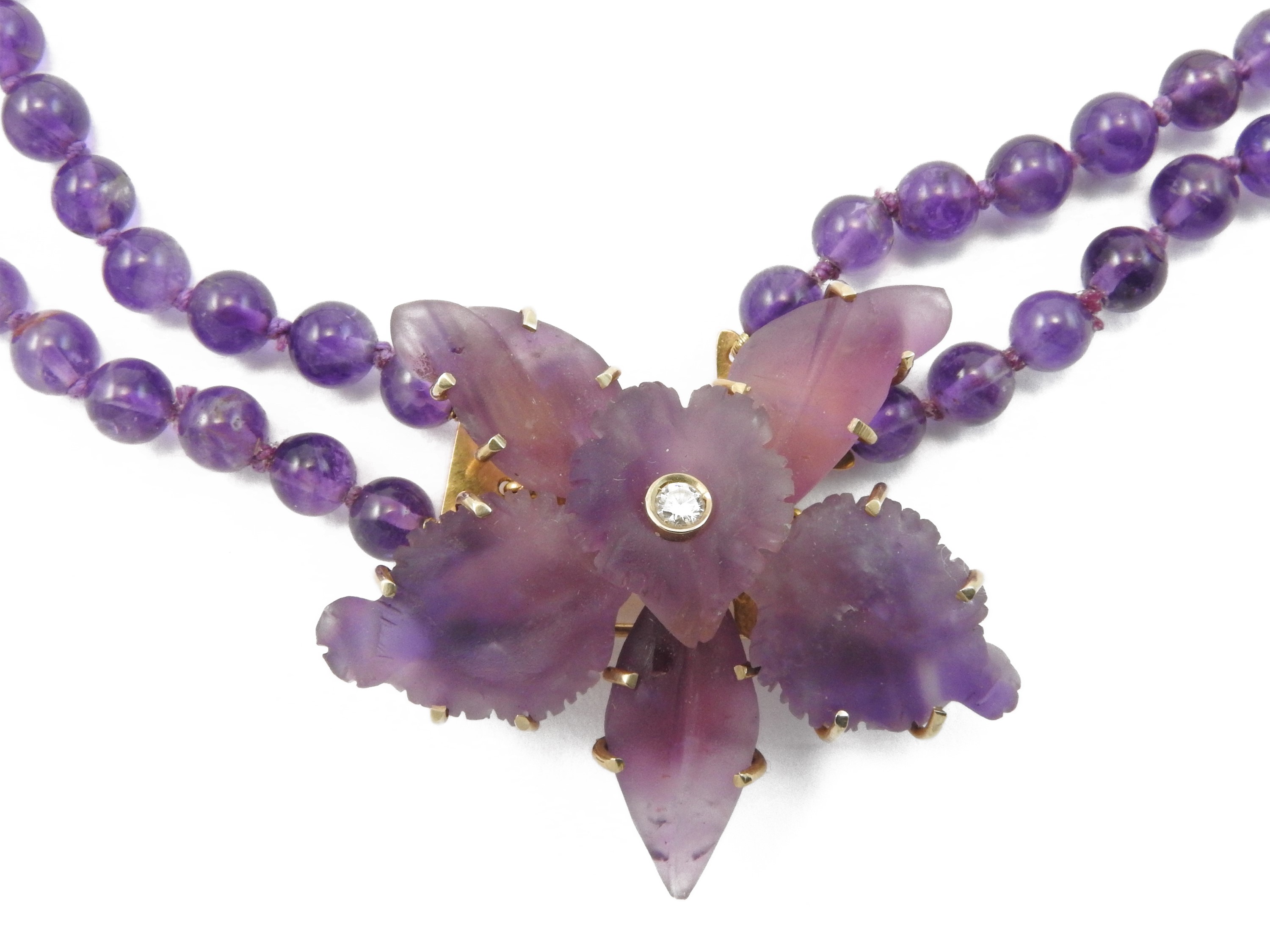 Collana spilla in oro giallo con diamante ed ametista