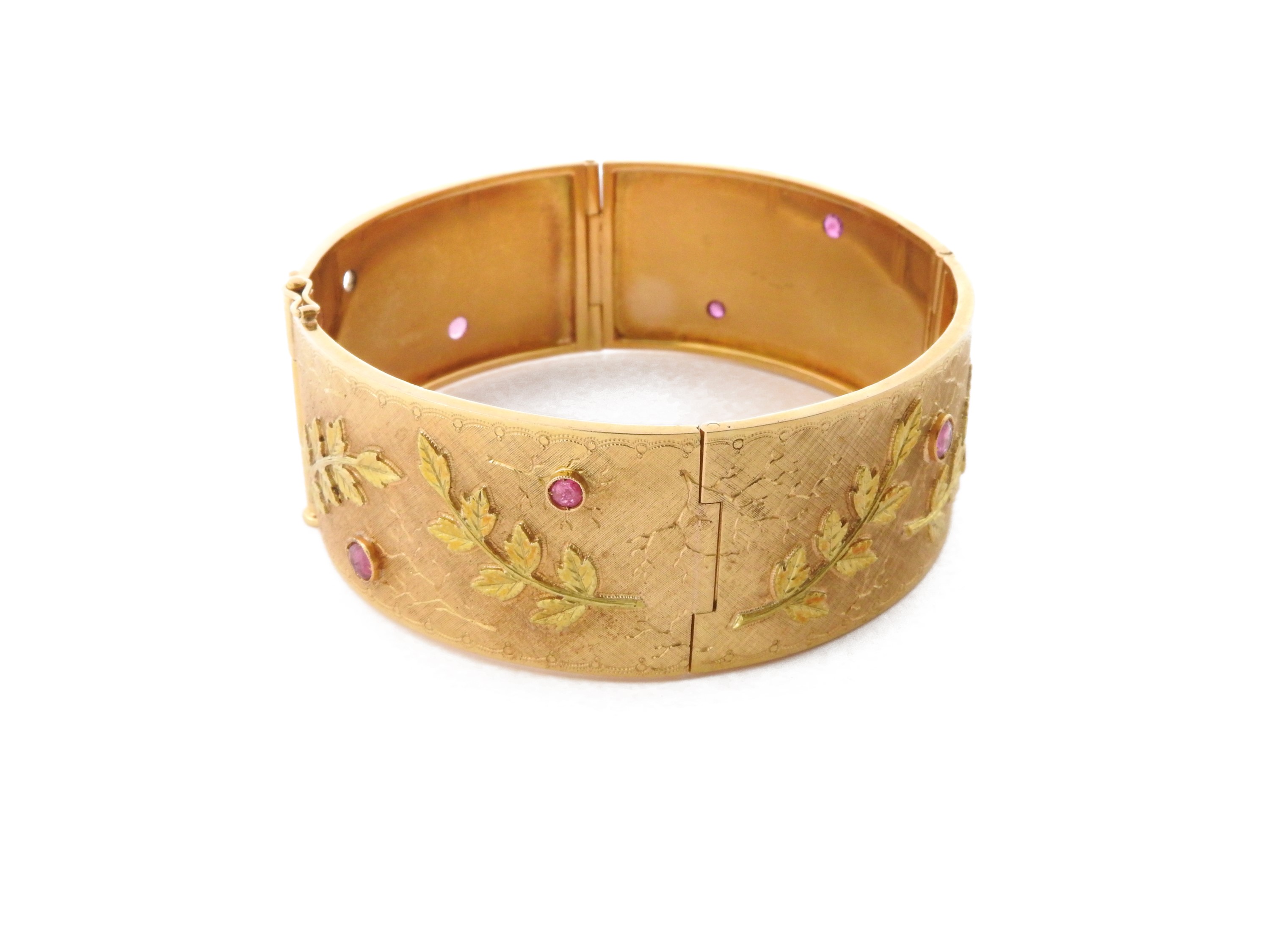 Bracciale a placche in oro giallo con rubini