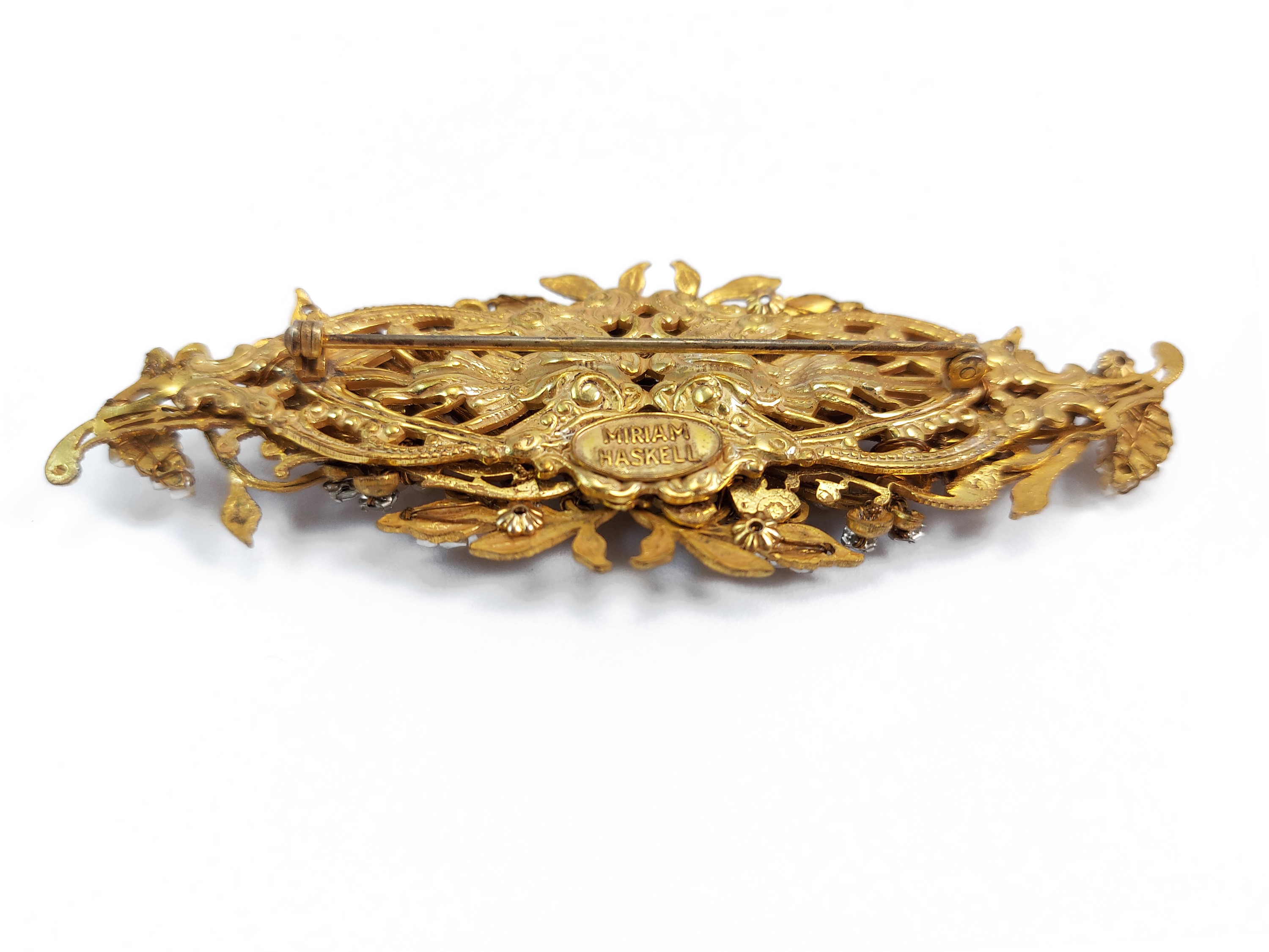 Miriam Haskell, Spilla in metallo gold tone