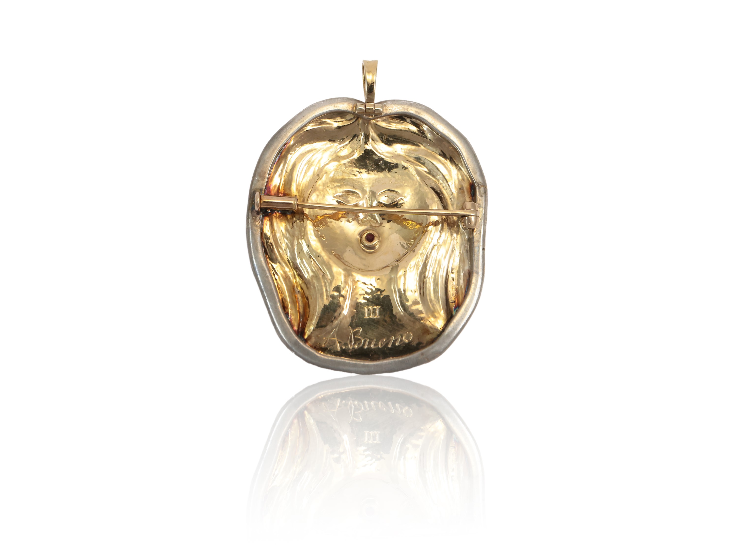 'Donna capelluta' 1975 Pendente in oro giallo con rubino