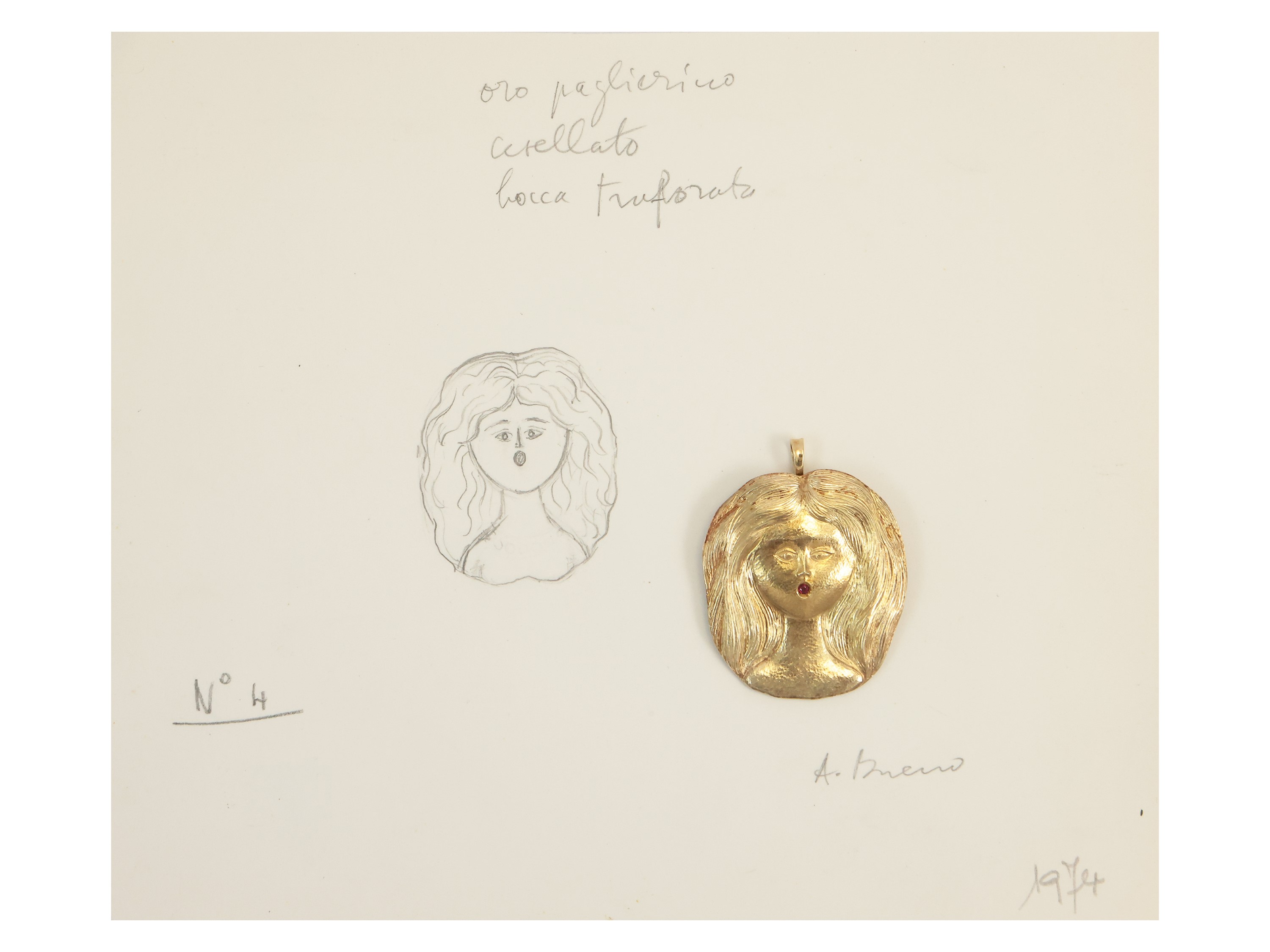 'Donna capelluta' 1975 Pendente in oro giallo con rubino